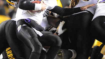 Steelers Troy Polamalu stops Ravens quarterback Joe Flacco on 4th and 1 in the first half tonight at Heinz Field.
1/14/2009