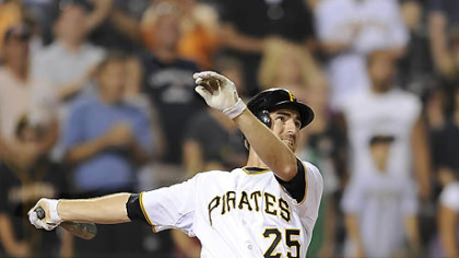 Pirates first baseman Adam LaRoche flies out with the bases loaded in the bottom of the ninth for the final out of the game last night.