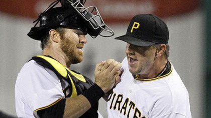 Closer Matt Capps, right, celebrates with catcher Ryan Doumit after getting the final out in last night's shoutout of the Giants.