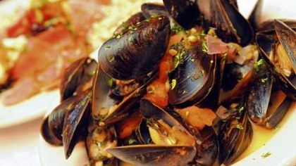 During Lent, Pizzutti's offers all-you-can-eat mussels, served above in a sauce made with tomatoes and white wine.