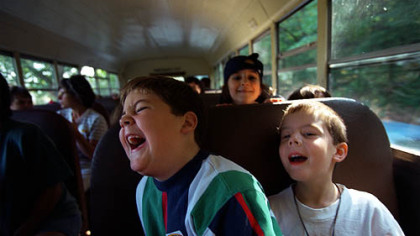 Tom and Alex share a laugh on a field trip to a pumpkin patch before Halloween, 1997.