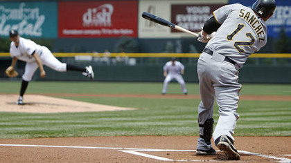 Freddy Sanchez singles to right field Sunday afternoon in the Pirates' 5-4 loss to the Rockies.