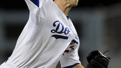 Dodgers pitcher Jon Garland pitches during the first inning.