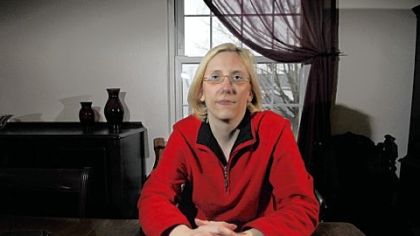 Jean Rohal, 40, of Bridgeville, is protesting that UPMC will not accept Tricare, a health insurance plan that covers active-duty military personnel.