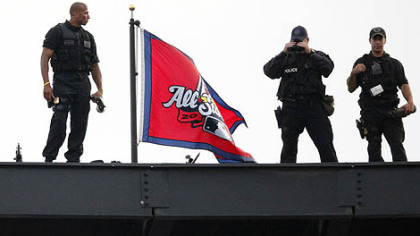 Police maintain position on the roof of Busch Stadium.