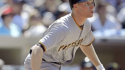 Brian Bixler watches his two-run double in the eighth inning yesterday in San Diego.
