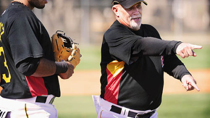 Perry Hill works with last year's No. 1 pick, third baseman Pedro Alvarez. Hill's career as an infield instructor dates to the early 1990s with the Texas Rangers.