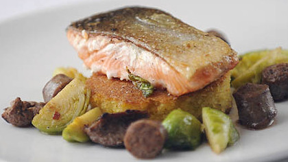 Jail Island Salmon with cornbread, merguez lamb sausage and brussel sprouts.