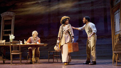 From left: Roger Robinson, Aunjanue Ellis and Andre Holland in a scene from "Joe Turner's Come and Gone."