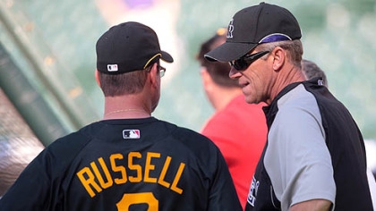 Pirates manager John Russell, left, chats with former Pirates manager and current manager of the Rockies, Jim Tracy, before a last night's game.  Tracy, who managed the Pirates for two seasons, was facing his former team for the first time since taking over as the manager of the Rockies.