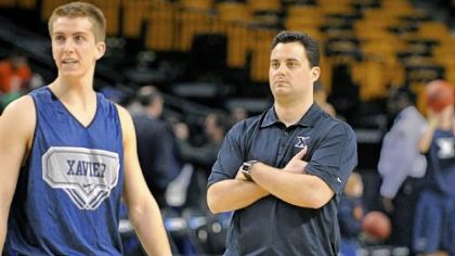 Sean Miller watches his Musketeers practice yesterday in Boston. At left is another Western Pennsylvania product, Brian Walsh of Moon and a freshman at Xavier.