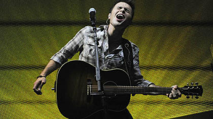 Kris Allen, the season 8 winner of American Idol, performs during the American Idols concert Saturday night.