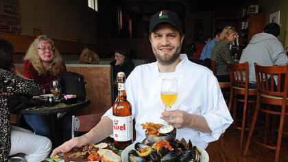 Chef Kevin Hunninen of Point Brugge Cafe, a popular neighborhood bistro in Point Breeze that serves Belgian -- inspired food and a wide range of Belgian beers.