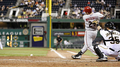 Diamondbacks first baseman Josh Whitesell breaks his bat and grounds out in the eighth inning.