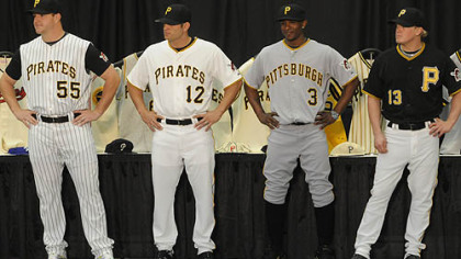 The Pirates today unveiled their lineup of jerseys for the 2009 season. It includes a new black alternate jersey (at right) as well as the addition of sleeves to the team's home white and road gray jerseys. The pinstriped uniform will be the only one without sleeves. Modeling were, from left, pitcher Matt Capps, second baseman Freddy Sanchez, and outfielders Nyjer Morgan and Nate McLouth.