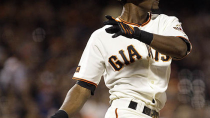 Giants second baseman Eugenio Velez swings for an RBI double off Pirates pitcher Charlie Morton during the sixth inning.