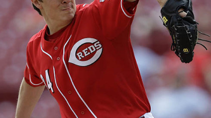 Reds pitcher Homer Bailey  pitches against the Pirates during the seventh inning. Bailey was the winning pitcher.