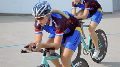 Sinead Miller and teammate Sierra Siebenlist riding in a summer competition at Major Taylor Velodrome.