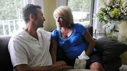 Jason Luhn and Kelly Frey, at home, talk about the joy and pain they share during her pregnancy.