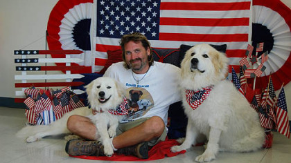 Luke Robinson of Austin, Texas  with his dogs, Murphy and Hudson.