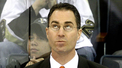 Philadelphia Flyers coach John Stevens, seen here watching the scoreboard in the third period last night, was fined by the NHL for the hit on the Penguins' Max Talbot in the waning seconds of the game.