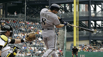Brewers outfielder Ryan Braun hits a solo home run off Pirates pitcher Paul Maholm during the first inning.
