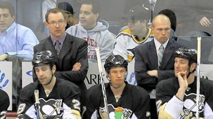 New Penguins interim coach Dan Bylsma stands next to assistant coach Mike Yeo in Thursday night's win over Montreal. The Penguins face two critical games this weekend.