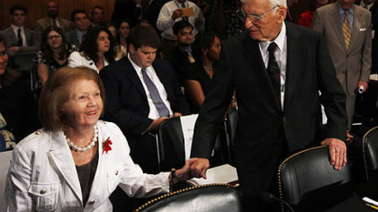 Steelers owner Dan Rooney holds his wife Pat's hand as they arrive on Capitol Hill in Washington yesterday for his confirmation hearing before the Senate Foreign Relations Committee.