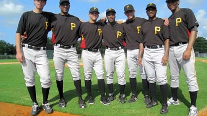 Seven Pirates prospects representing five continents, left to right: Pitcher Mitch Fienemann of Australia, pitcher Rinku Singh of India, shortstop Benji Gonzalez of Puerto Rico, second baseman Gift Ngoepe of South Africa, infielder Elevys Gonzalez of Venezuela, pitcher Dinesh Patel of India and first baseman Gerlis Rodriguez of the Dominican Republic.