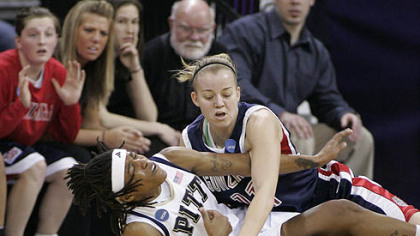 Pitt's Shavonte Zellous, left, and Gonzaga's Janelle Bekkering fight for a loose ball in the first half last night in Seattle.