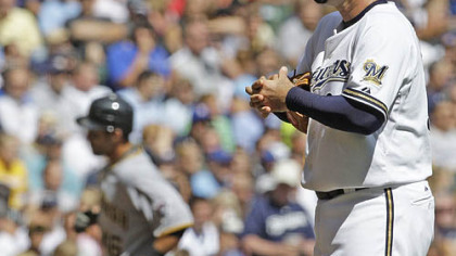 Brewers starting pitcher Jeff Suppan looks home as the Pirates' Garrett Jones rounds the bases after hitting a home run during the third inning yesterday in Milwaukee.