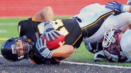 North Allegheny's Alex Papson scores the first touchdown of the game last night versus Altoona.