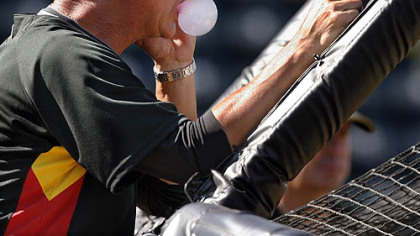 Pirates manager John Russell, seen here watching his team take batting practice before a mid-March spring training game against the Tampa Bay Rays in Bradenton, Fla.