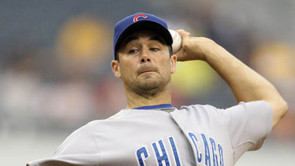 Cubs pitcher Ted Lilly throws in the first inning.