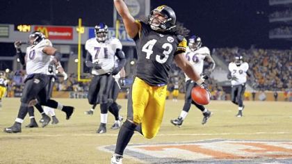 Troy Polamalu scores with 4 minutes and 24 seconds left in the AFC championship game at Heinz Field last night, an interception return that sealed the Steelers' victory.