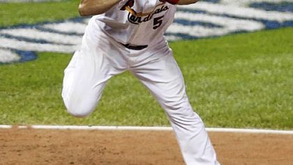 Cardinals first baseman Albert Pujols avoids getting hit by a pitch from White Sox pitcher Mark Buehrle during the third inning.