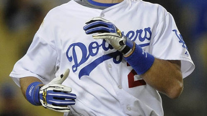Dodgers third baseman Casey Blake reacts after being hit by a pitch during the fourth inning.