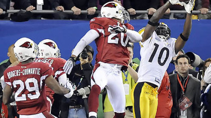Steelers wide receiver Santonio Holmes pulls in the winning touchdown pass against the Cardinals in Super Bowl XLIII.