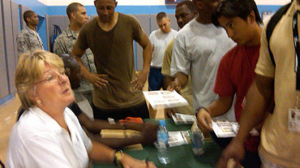 AB signing autographs after Navy vs. Air Force basketball game.