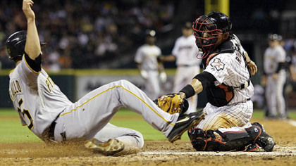 Astros catcher Ivan Rodriguez, right, tags out Pirates catcher Jason Jaramillo as he tries to score during the seventh inning of last night's game.
