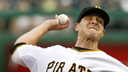 Pirates pitcher Kevin Hart pitches in the third inning of his first game as a Pirate.