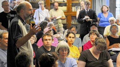 Jules Lobel, a University of Pittsburgh professor and vice president of the Center for Constitutional Rights, speaks at East Liberty Presbyterian Church during the meeting held by various groups looking to protest the upcoming G-20 summit.