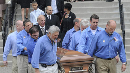 Billy Mays' casket is carried out of St. John of God Catholic Church in McKees Rocks following his funeral Mass.