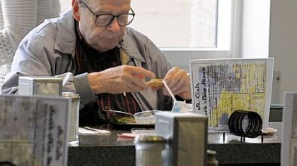 Earl Haag, of Whitehall, eats lunch at the old snack bar at St. Clair Hospital. He has come to the snack bar since 1952 whe his wife delivered their first of three children.