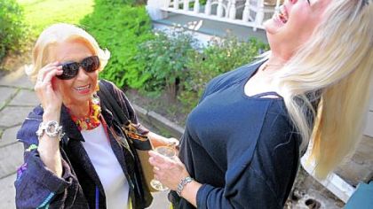 Delores Smith Barber, left, and Donna Rae (Terminal Stare on the old "Chiller Theater") share a laugh at the monthly get-together in Sewickley.