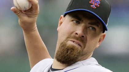 Mets pitcher Tim Redding throws in the first inning yesterday.