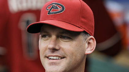 Diamondbacks manager A.J. Hinch smiles during last night's game.