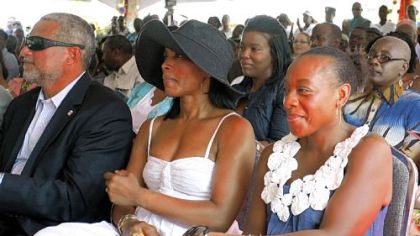 Actresses Angela Bassett, center, and Marianne Jean-Baptiste, right, accompanied by Antigua and Barbuda's Tourism Minister John Maginley, attend a ceremony renaming Antigua's highest mountain "Mount Obama."