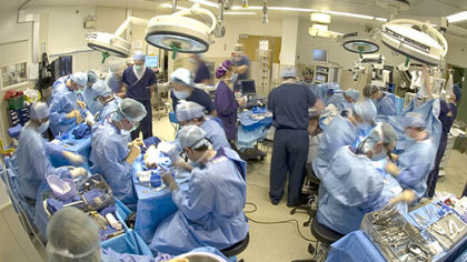 The surgical teams at UPMC perform the double hand transplant.