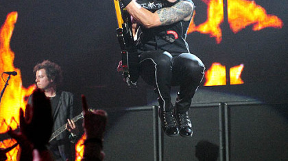 Green Day's bassist Mike Dirnt performs during "21st Century Breakdown" to open their concert last night at Mellon Arena.